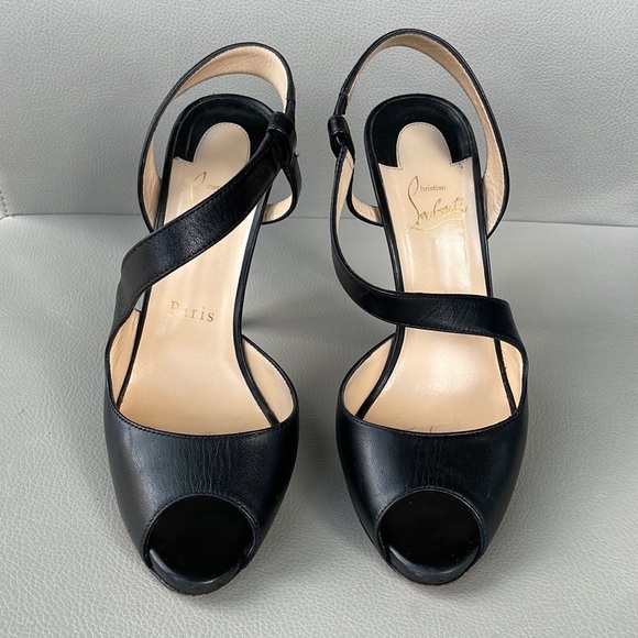 Christian Louboutin black leather peep toe sling back heel. Size 37